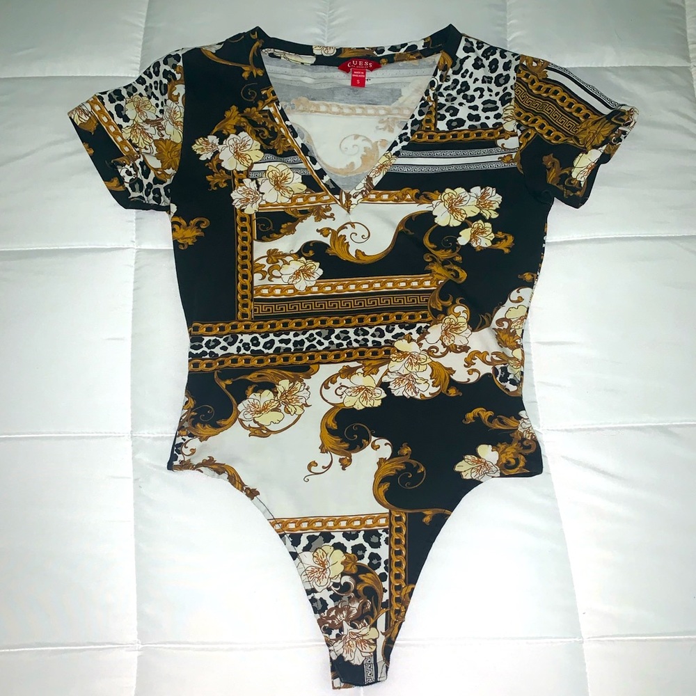 Guess- short sleeve bodysuit. Multicolored. Size Small